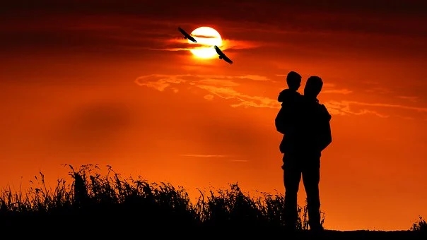 The shoulders of a caring dad is the safest place