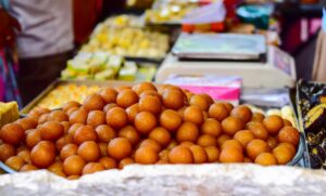 A Sweet shop offering  a variety of mithai